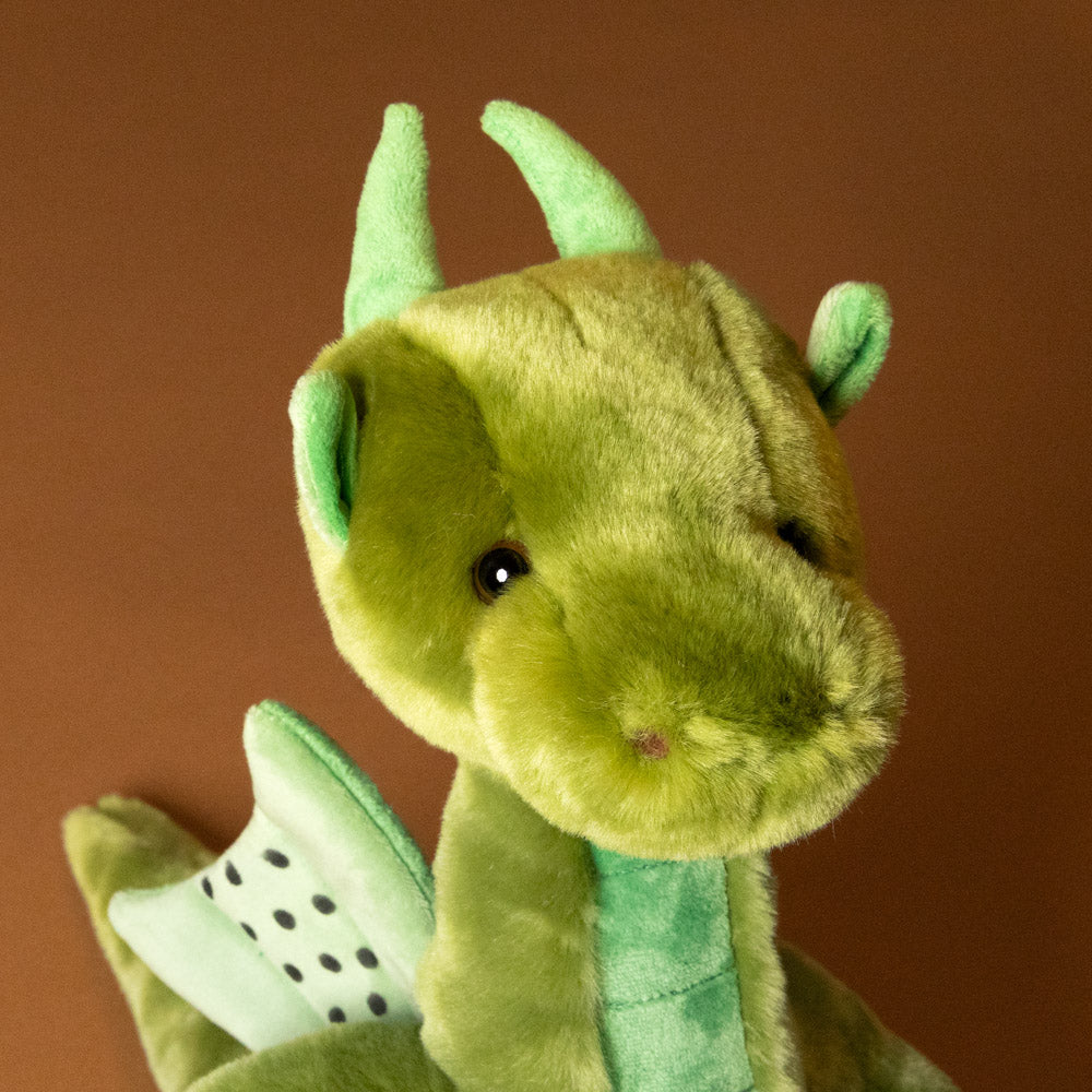deck-the-forest-dragon-green-stuffed-animal-face