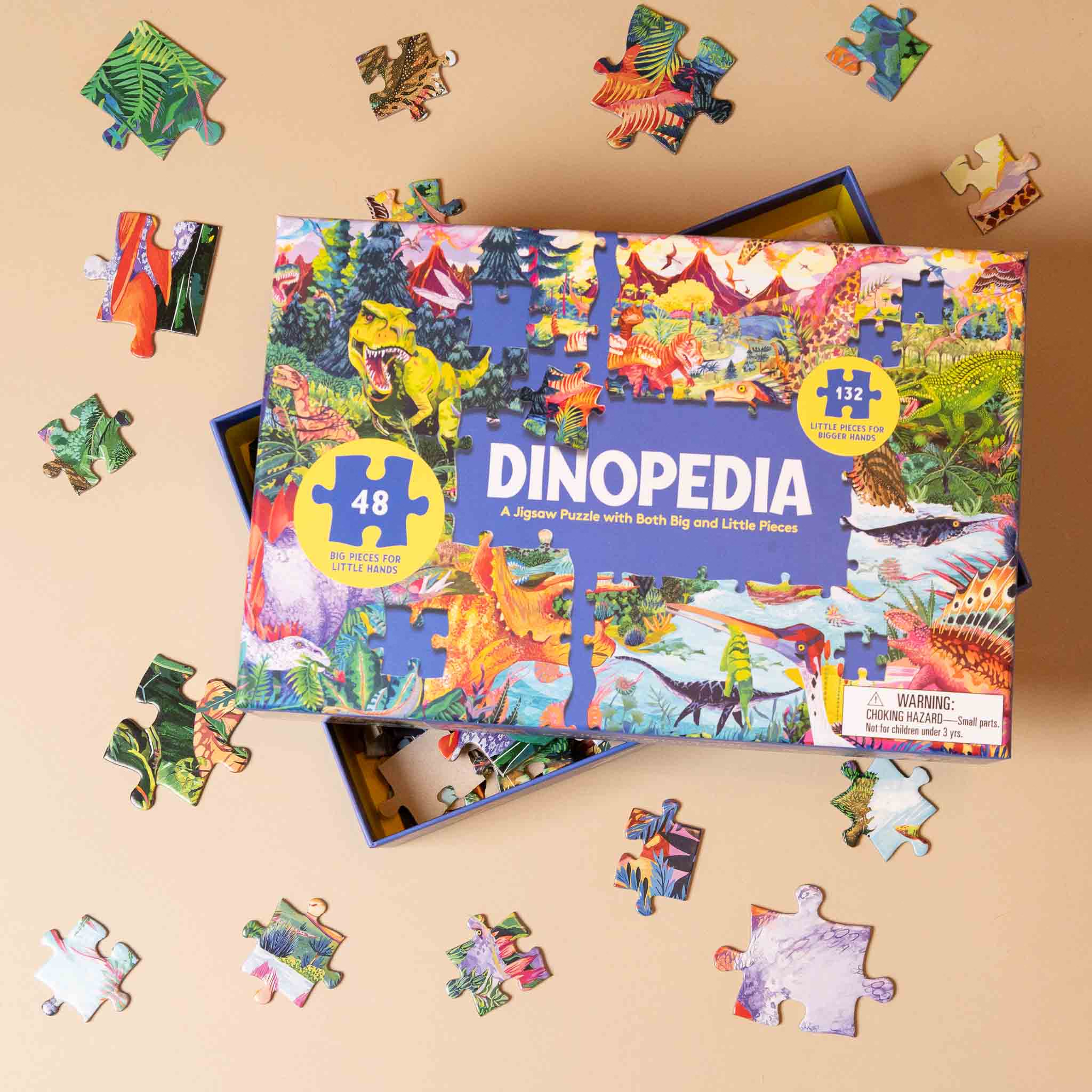 Dinopedia puzzle set with colorful dinosaur illustrations on a beige background