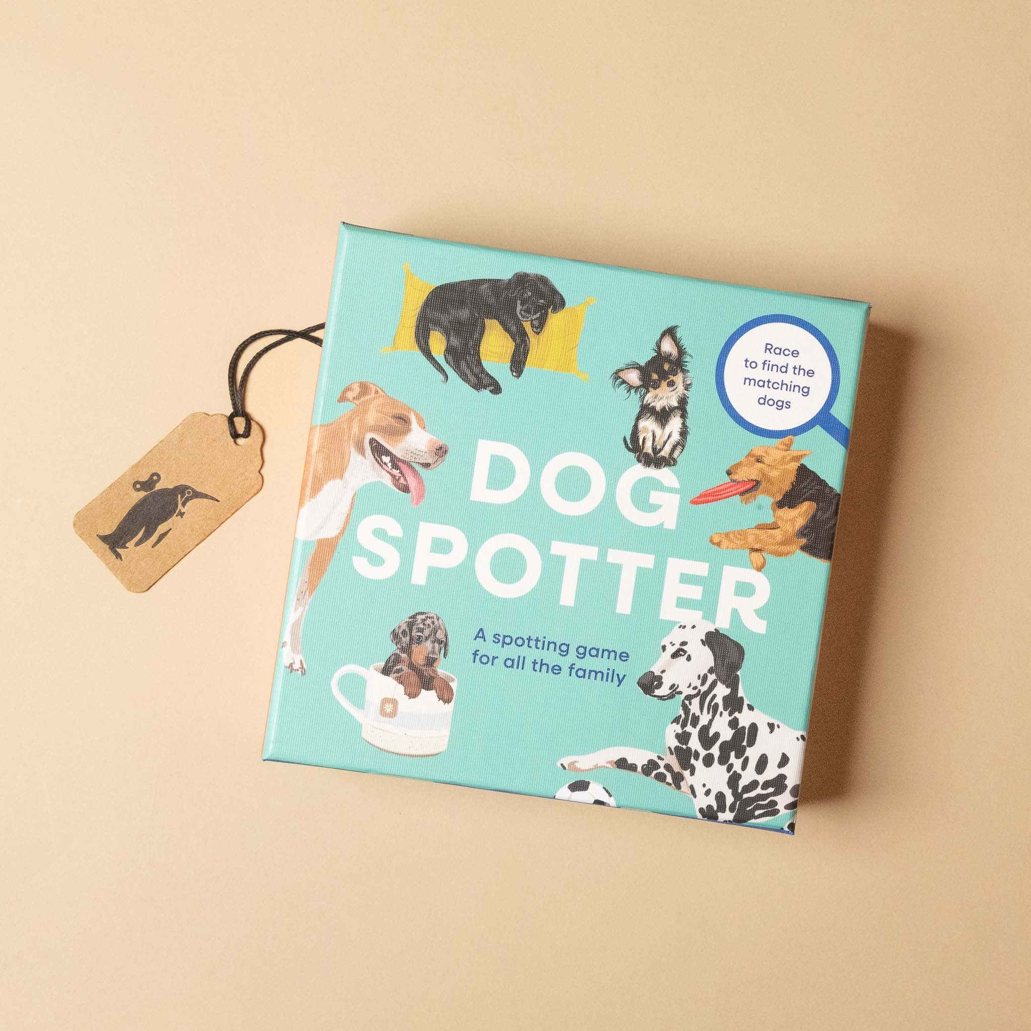 Box of 'Dog Spotter' game with illustrations of dogs on a beige background