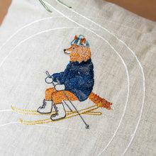 Load image into Gallery viewer, embriodered-fox-with-navy-coat-and-hat-on-euchre-skis