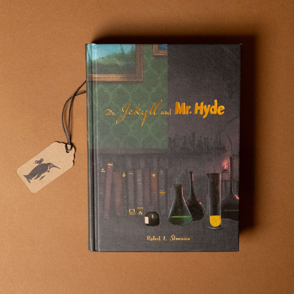 Book titled 'Dr. Jekyll and Mr. Hyde' with a tag on a brown background