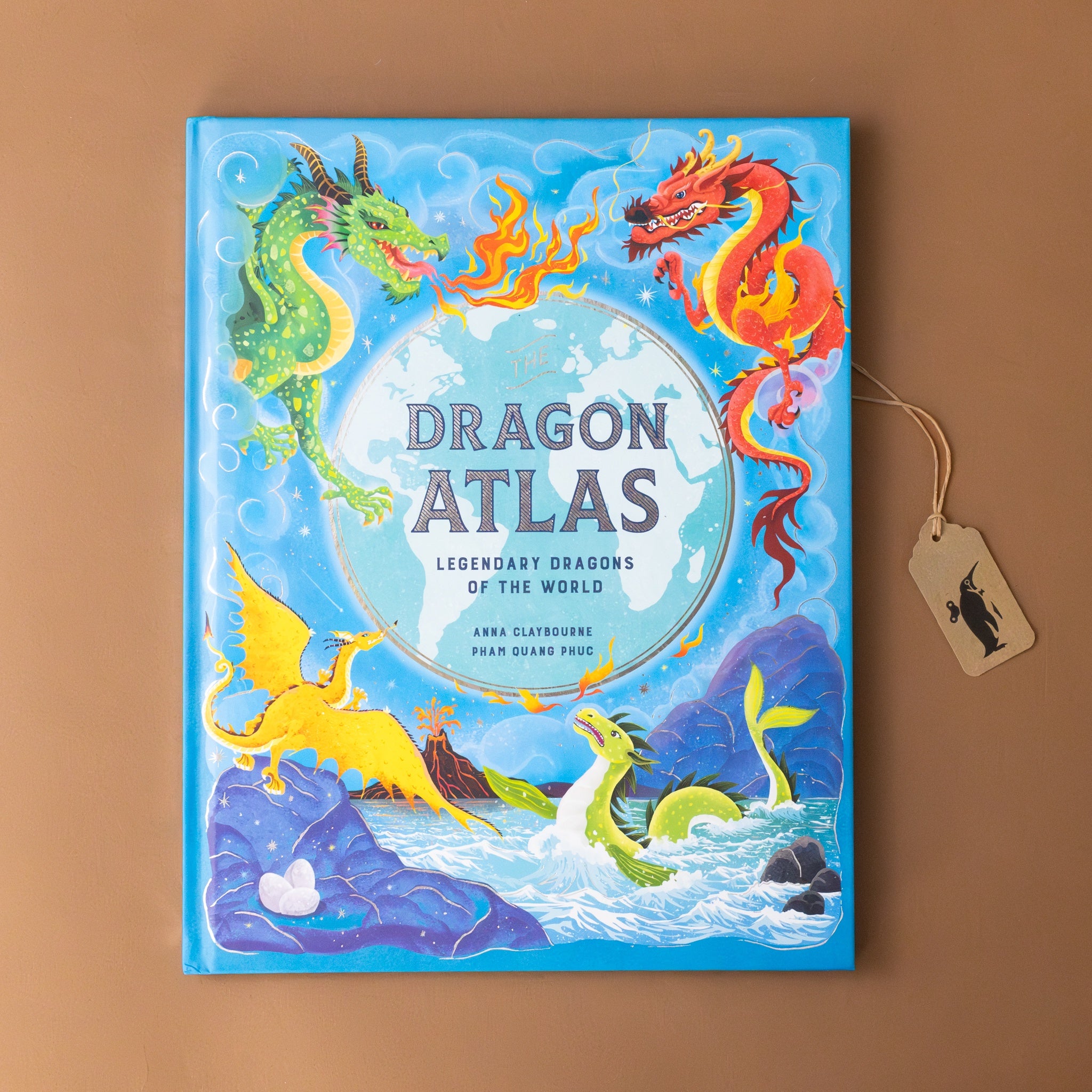 dragon-atlas-legendary-dragons-of-the-world-ocean-blue-cover-with-colorful-dragons-surrounding