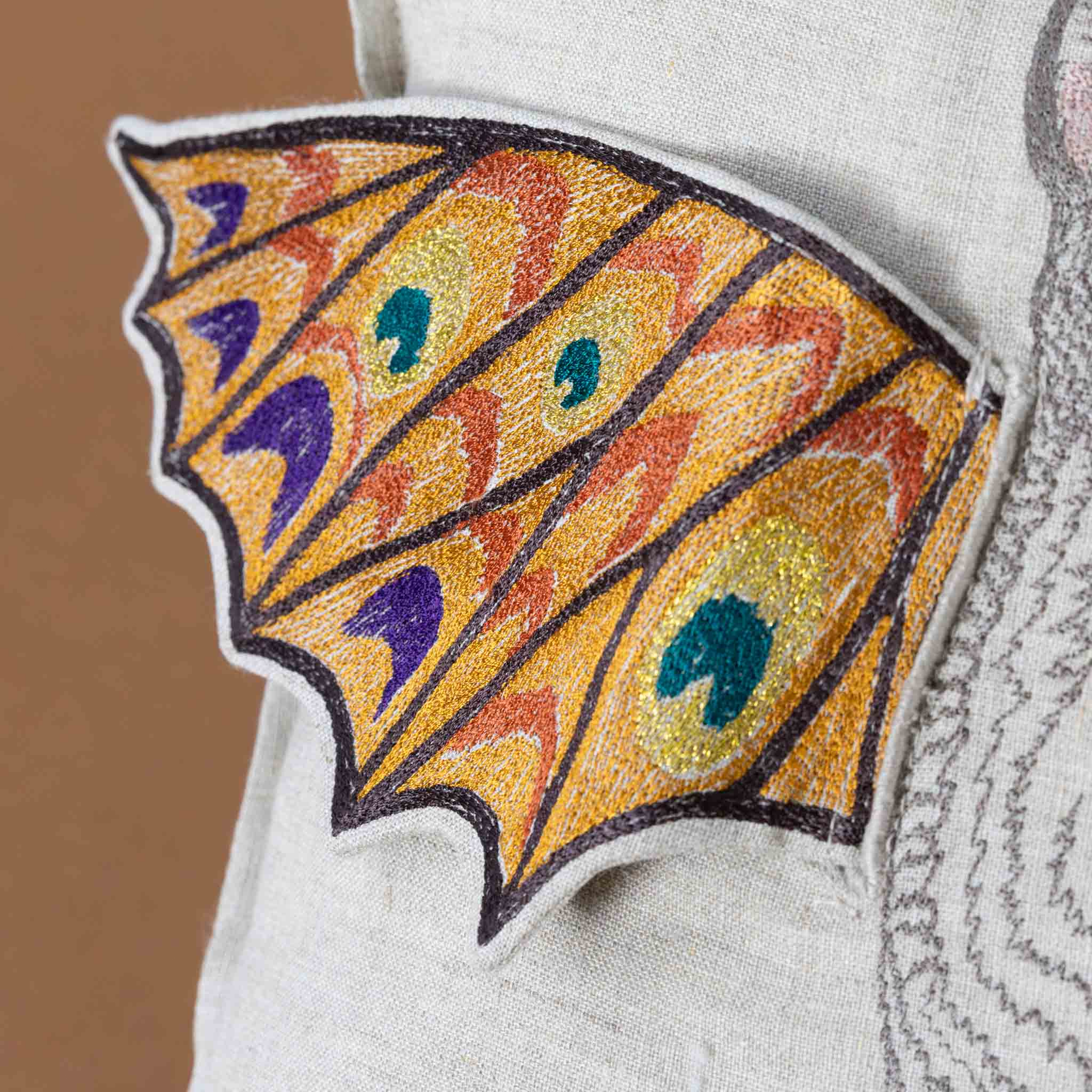 Embroidered Pillow | Bat Wing Surprise