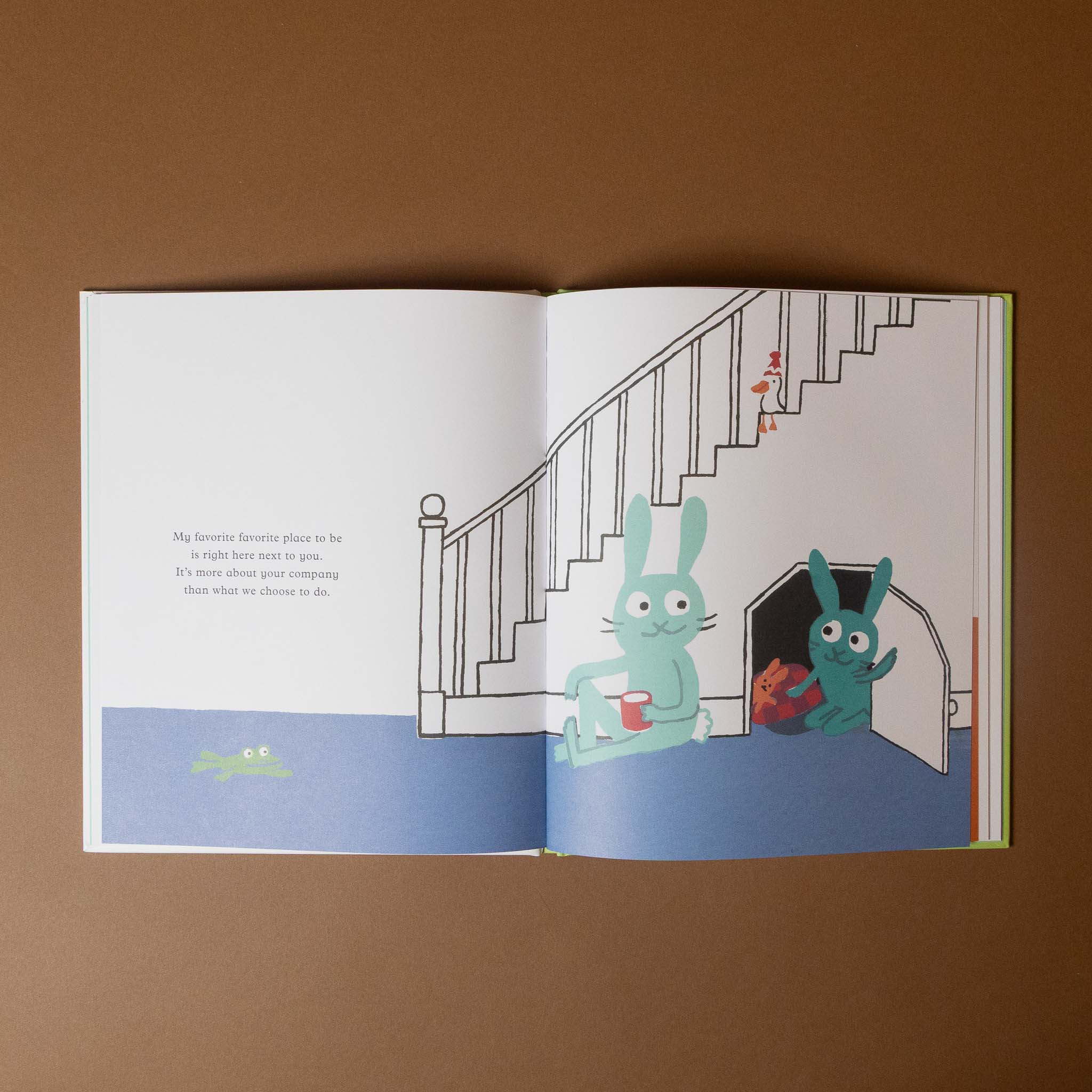 Open book with cartoon characters on a staircase and door illustration.