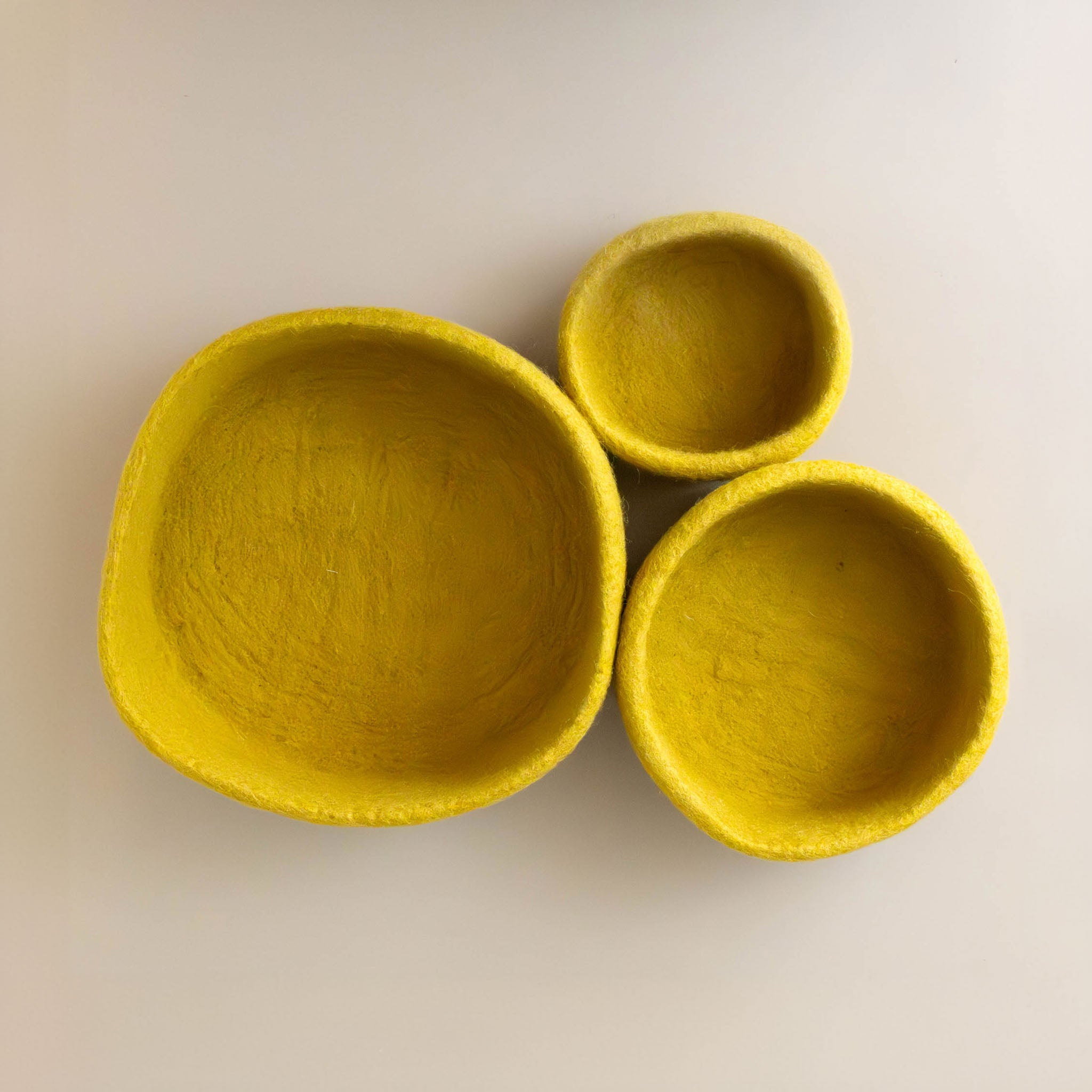 felt-dish-ochre-large-medium-small-above