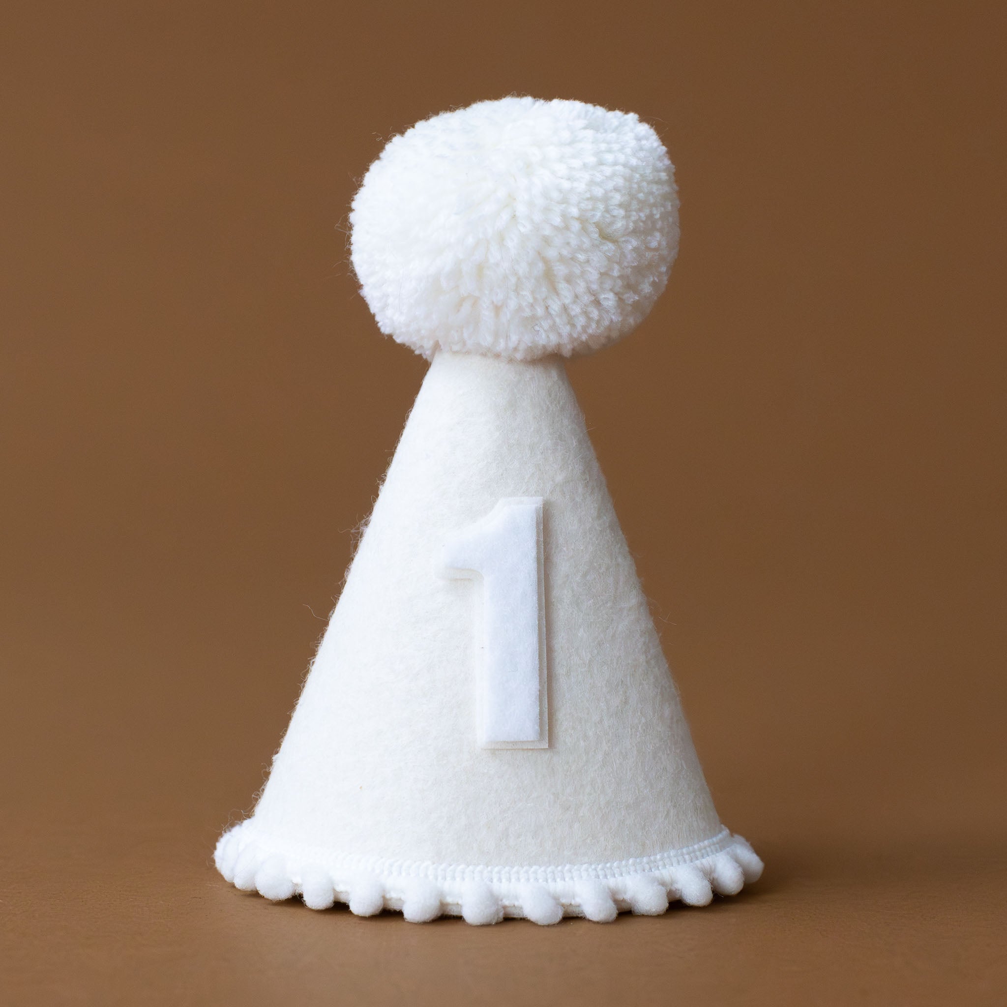 felt-pom-party-hat-linen-white