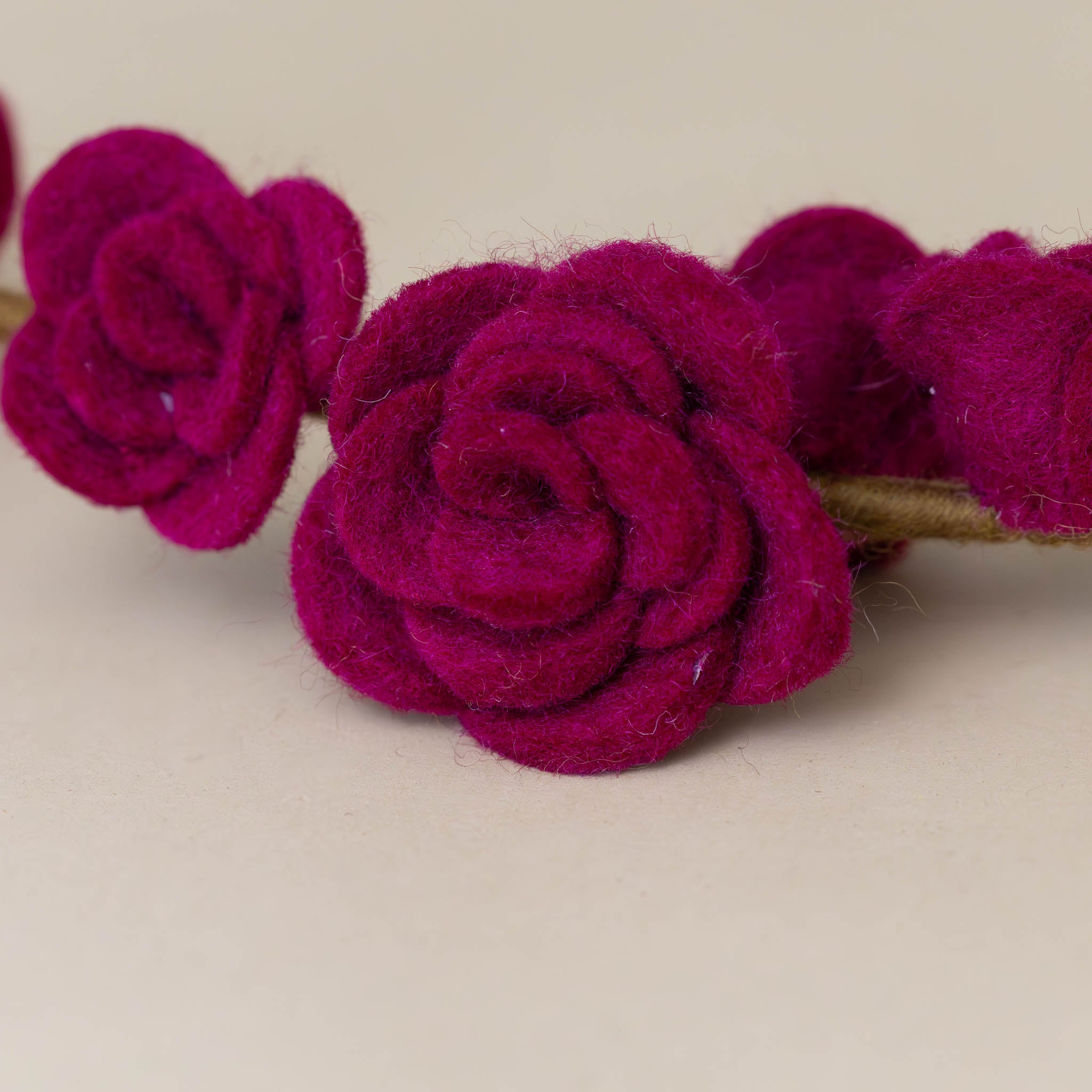 close-of-rose-petals-felt-rose-branch-cerise