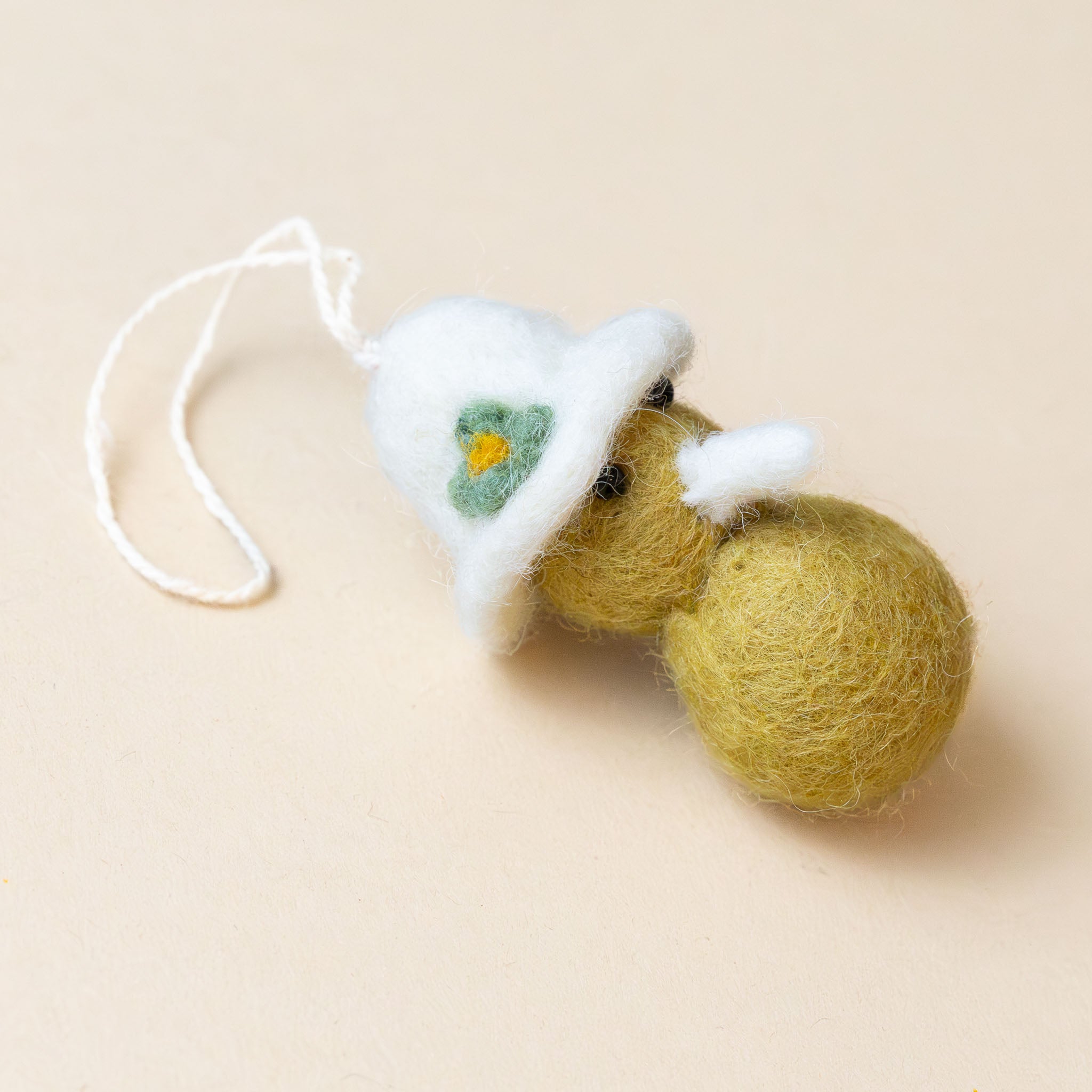 felted-chickie-ornament-garden-hat-yellow-side