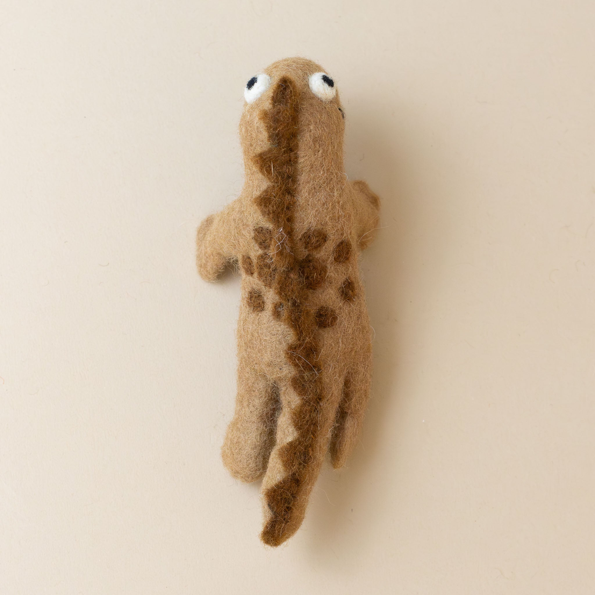 felted-finger-puppet-brown-dinosaur-spine-back