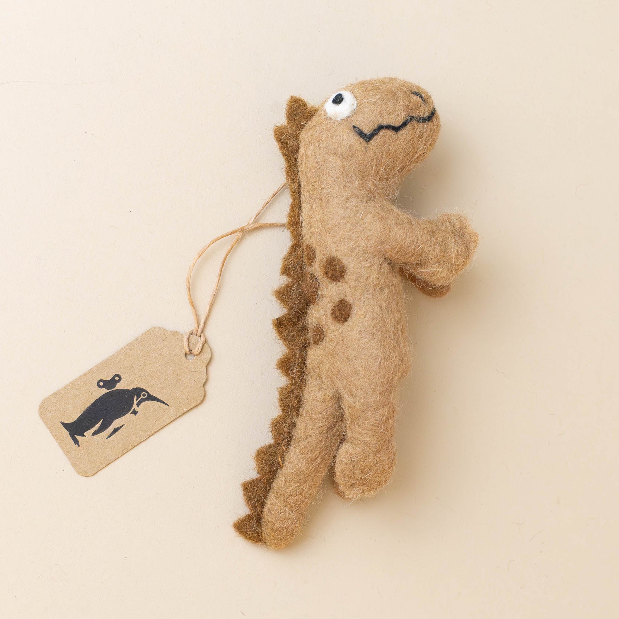 felted-finger-puppet-brown-dinosaur