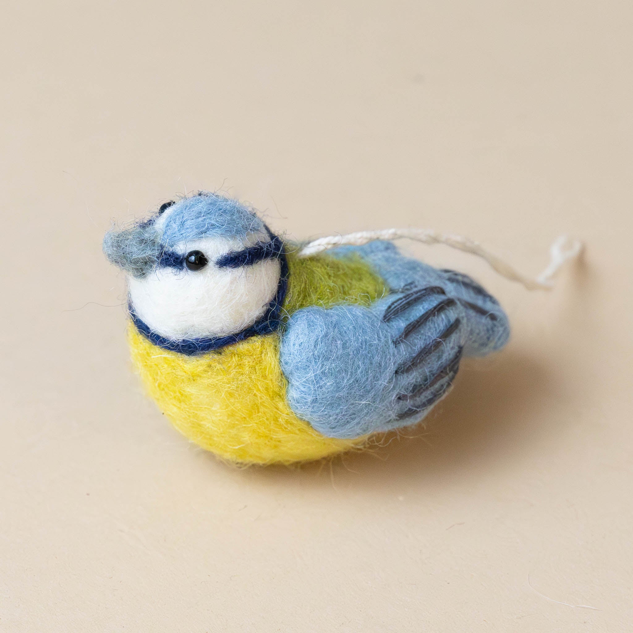 felted-kaleidoscope-bird-ornament-blue-side