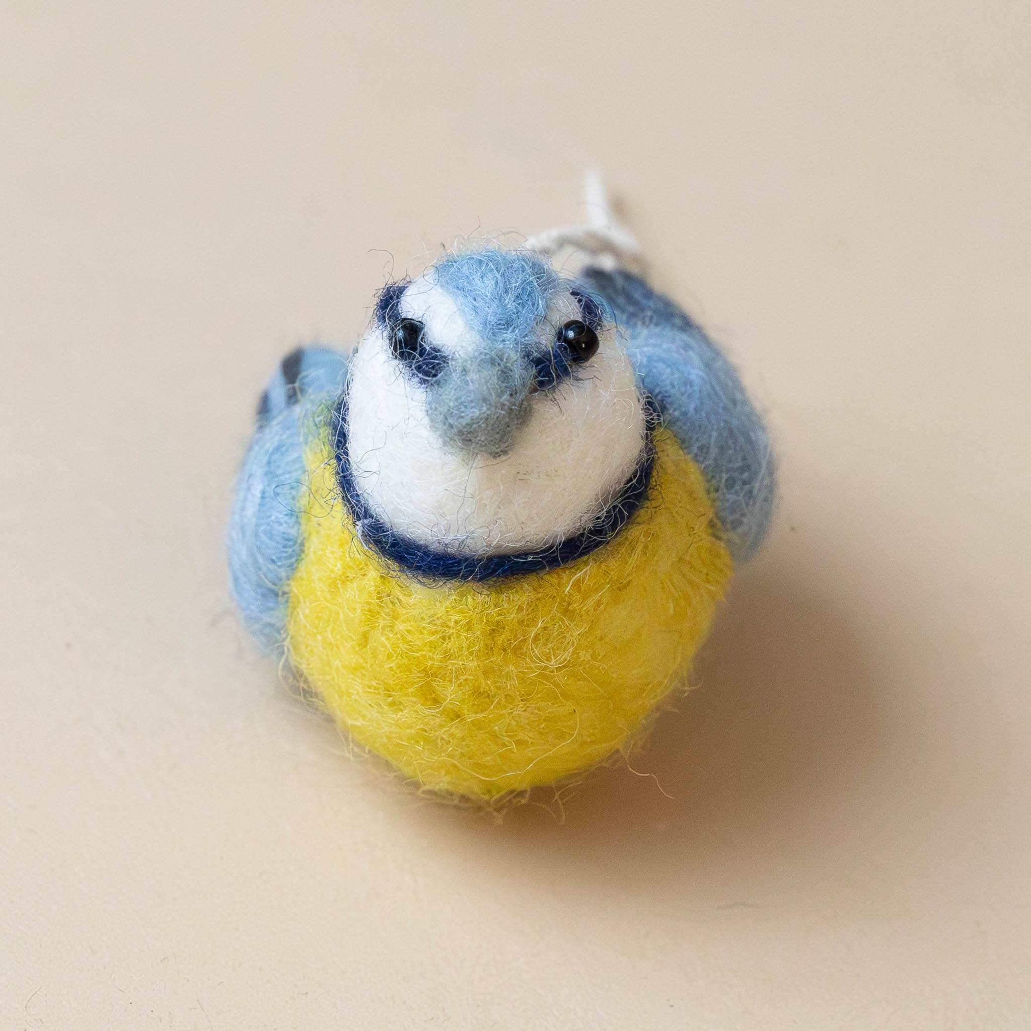 felted-kaleidoscope-bird-ornament-blue-face