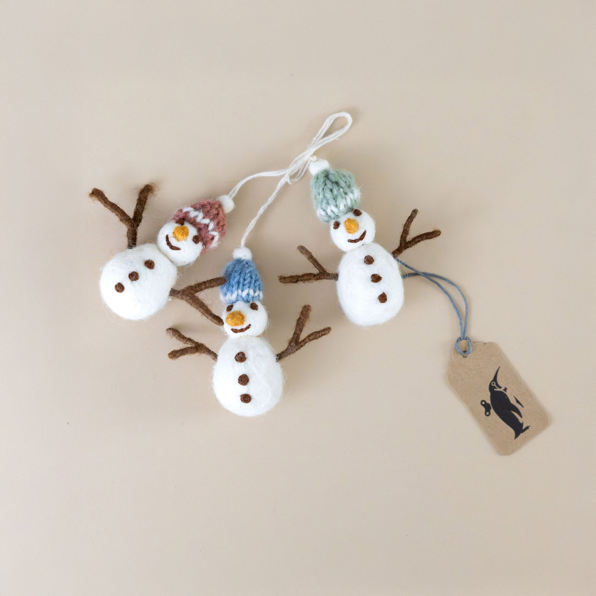 felted-snowman-with-knit-hats-ornament-trio-pink-blue-green-hats