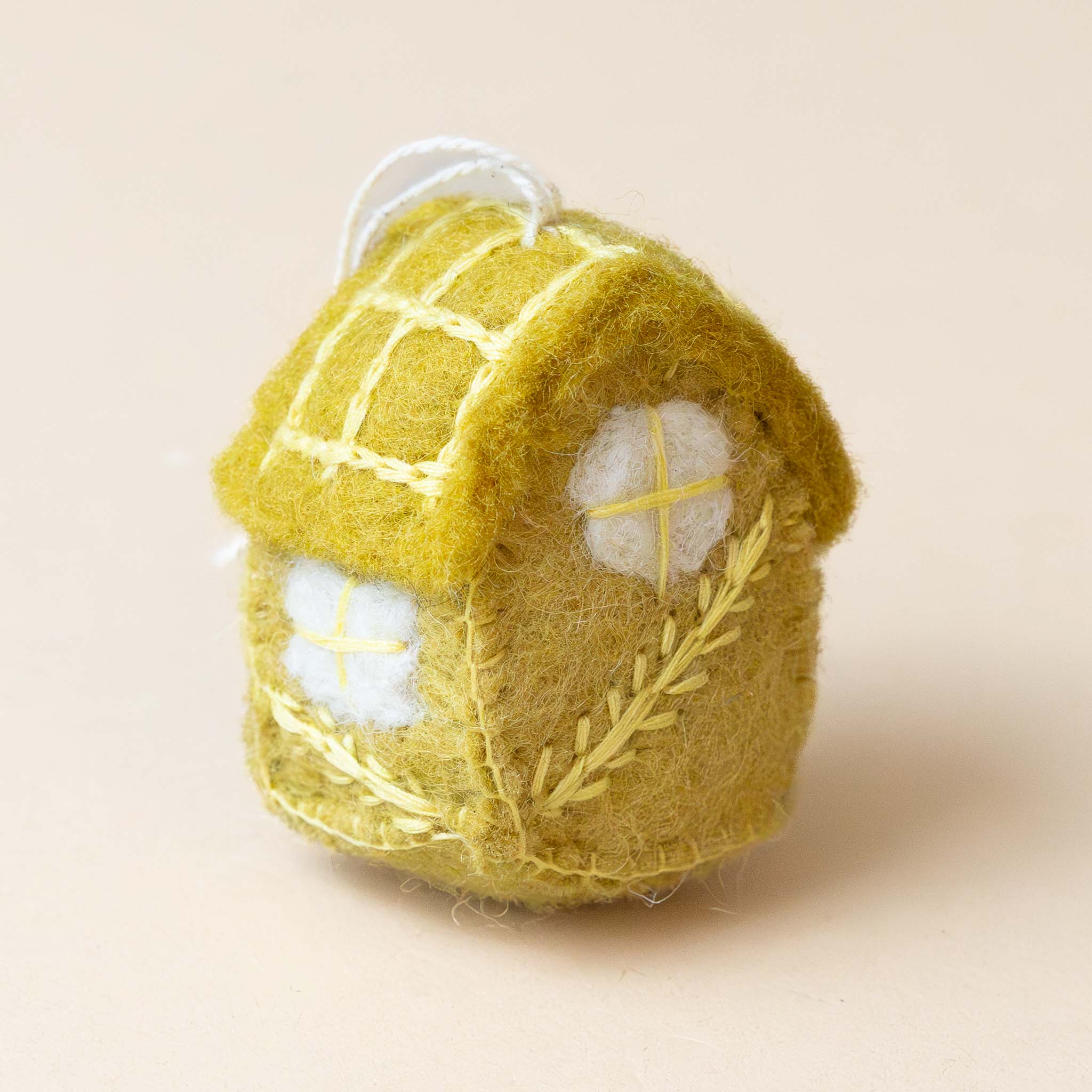 felted-spring-house-ornament-ochre-back