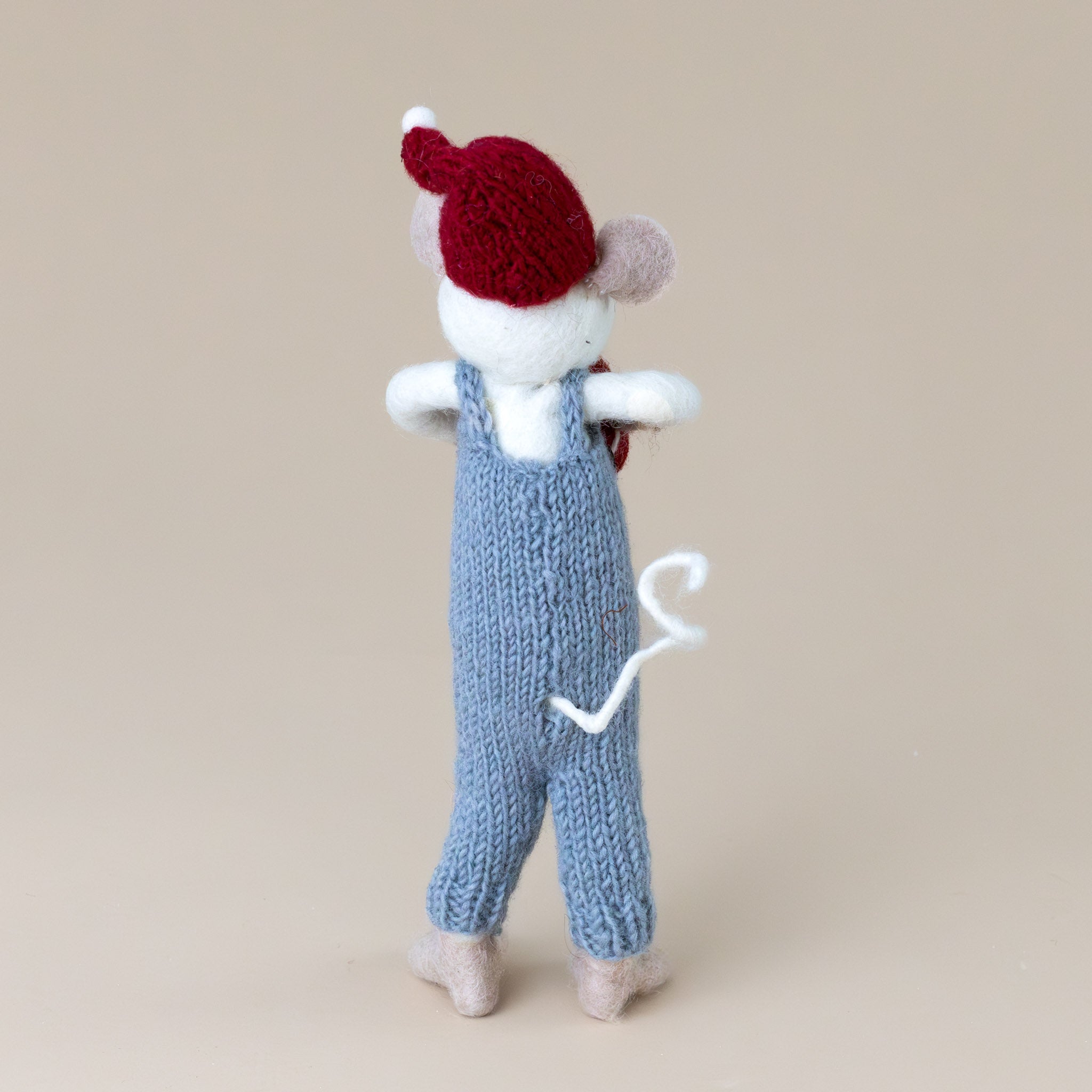 felted-white-mouse-blue-overalls-with-red-present-back-with-curly-tail