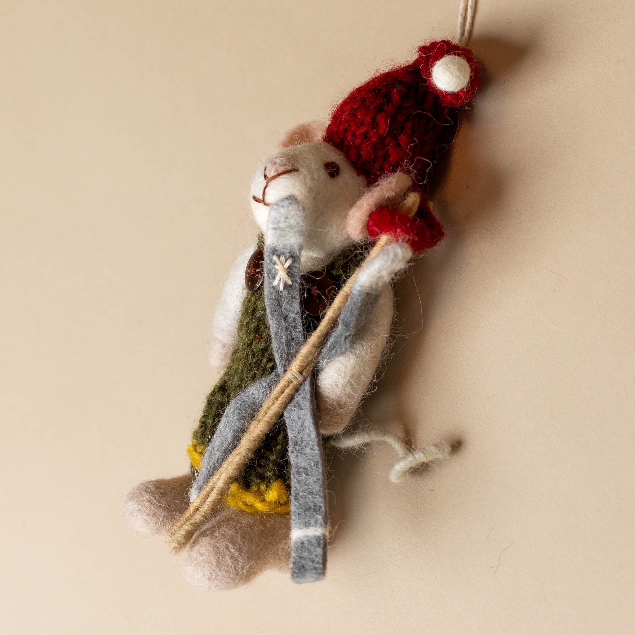 felted-white-mouse-ornament-green-overalls-and-skis-side