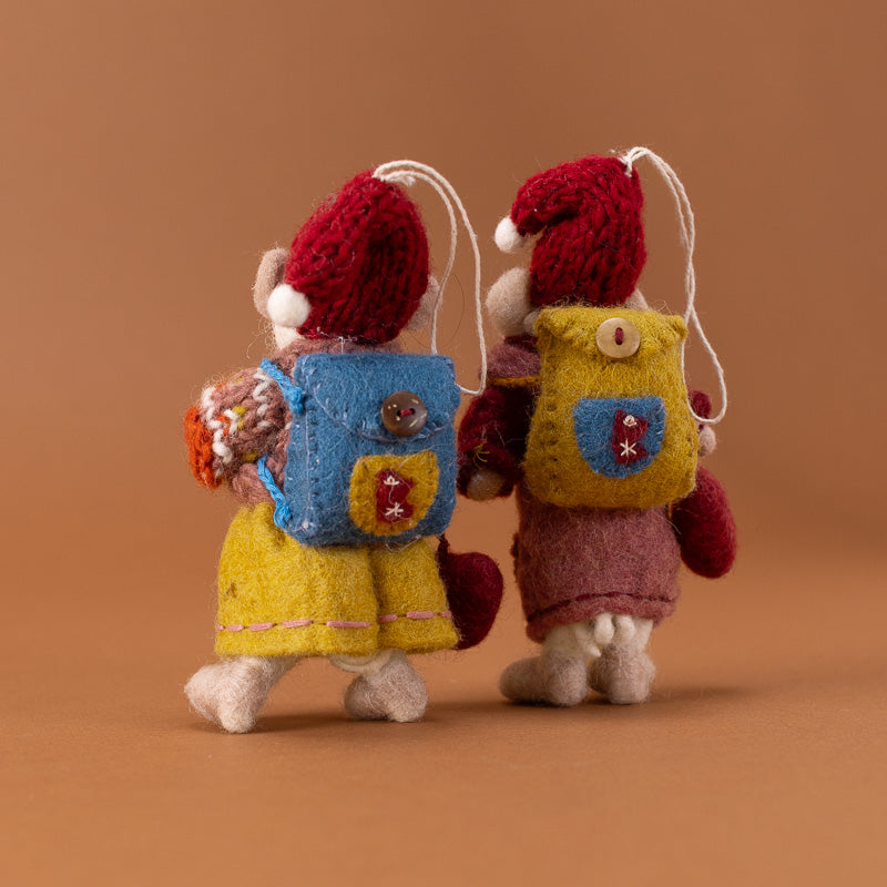 felted-white-mouse-ornament-set--spreading-kindness backs with backpacks