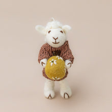 Load image into Gallery viewer, felted-white-sheep-ornament-mauve-dress-with-ochre-egg-standing