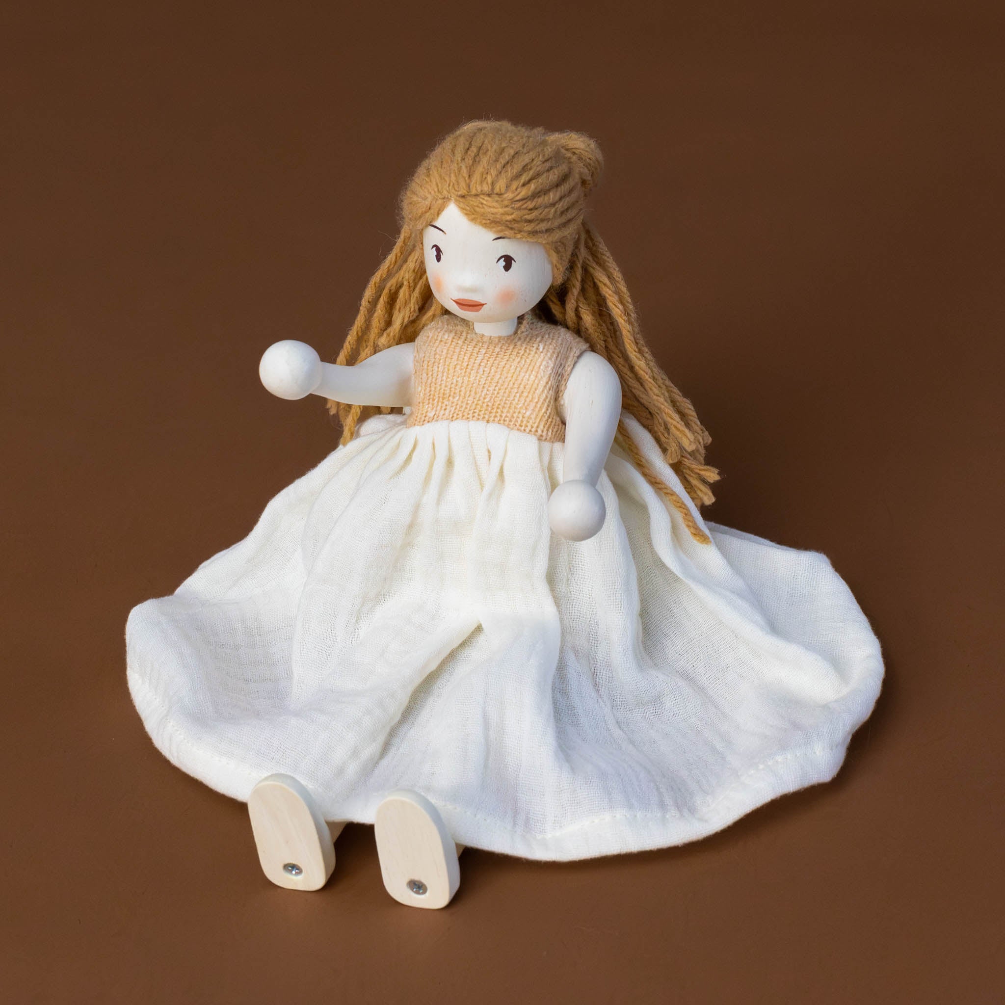 ferne-wooden-doll-sitting