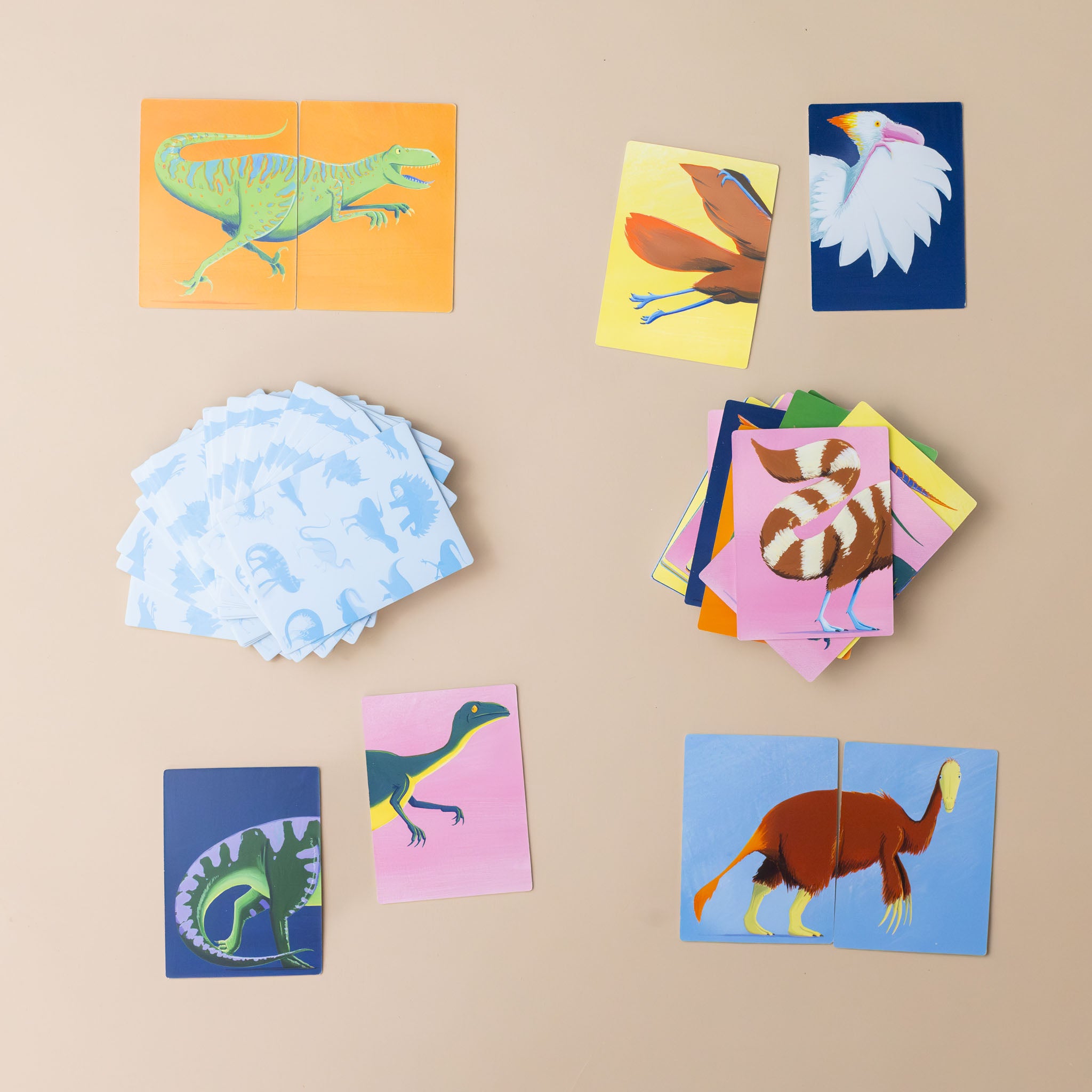 colorful-playing-cards-for-find-my-behind-a-dinosaur-memory-game-with-many-different-dinosaur-creatures