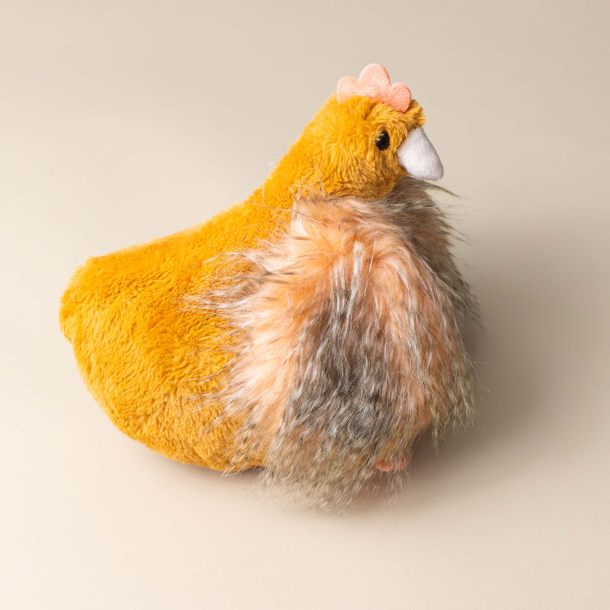 floofy-chicken-orange-stuffed-animal-side