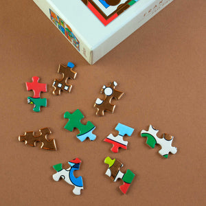 example-puzzle-pieces-colored-red-green-gold foil-white-blue
