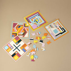 puzzle-piece-examples-with-4-inserts-showing-completed-design-in-aqua-maroon-peach-pink-black-yellow-and-cream