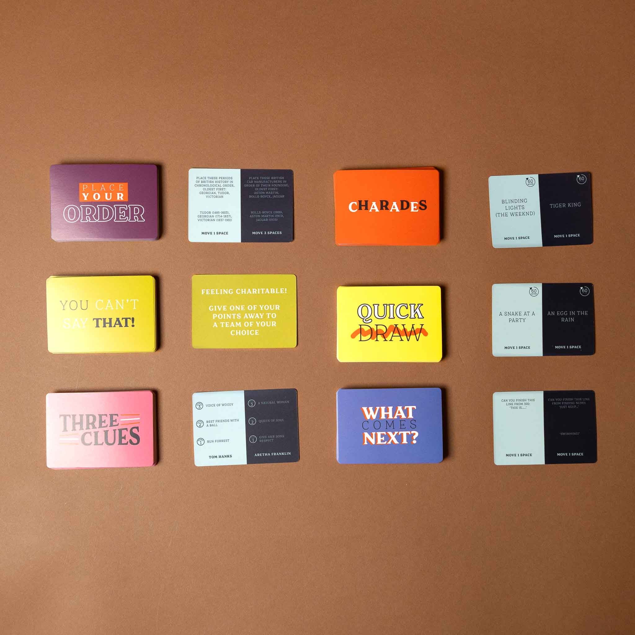 friends-and-family-games-night Collection of colorful game cards on a brown background
