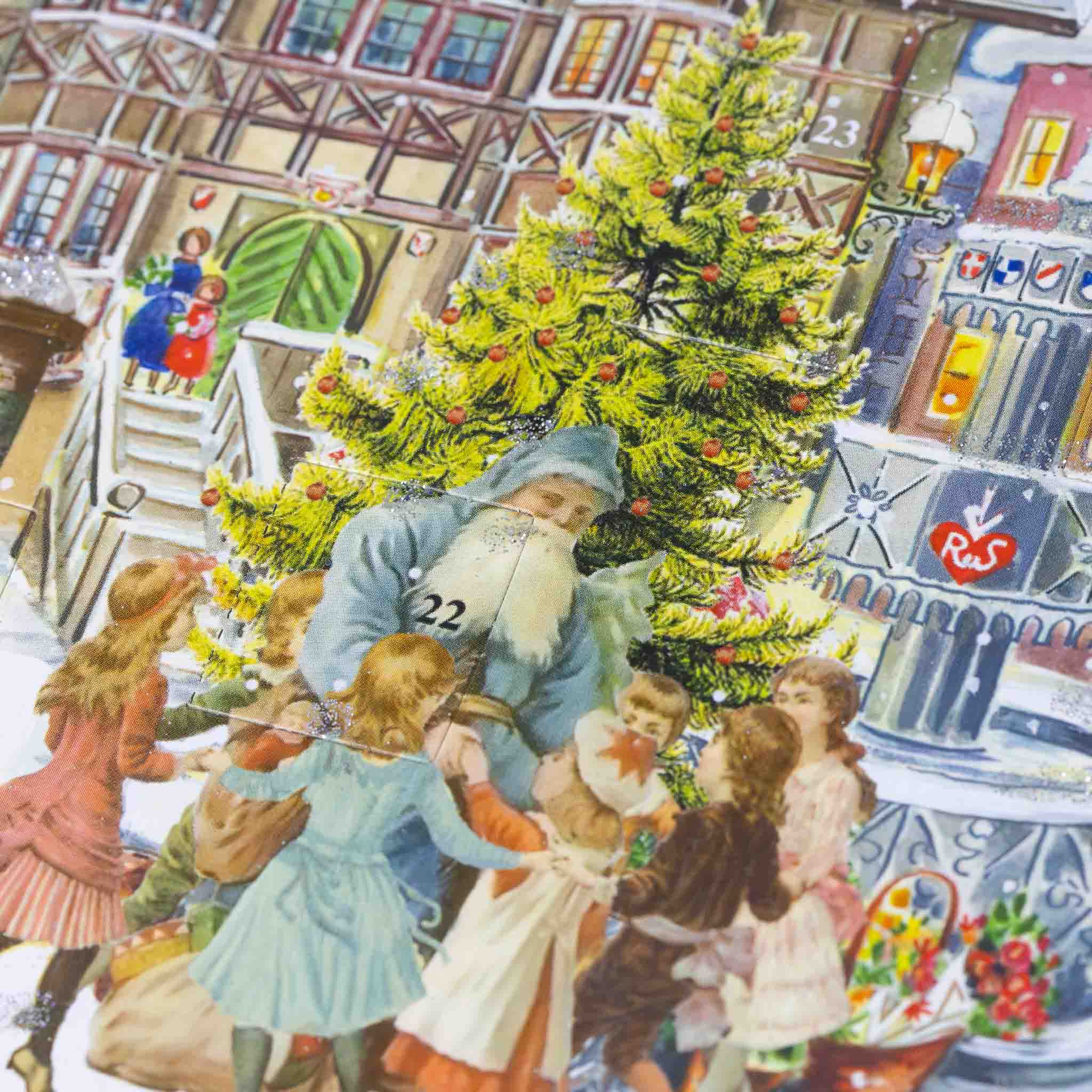 santa-dressed-in-a-blue-robe-with-children-circling-about-and-christmas-tree-in-the-backgroudn