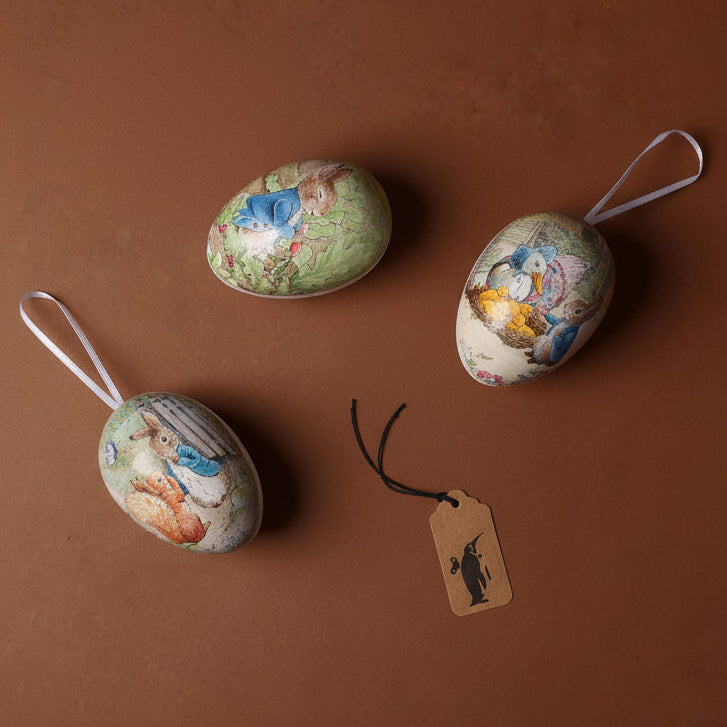 Decorative Easter eggs with illustrations on a brown background