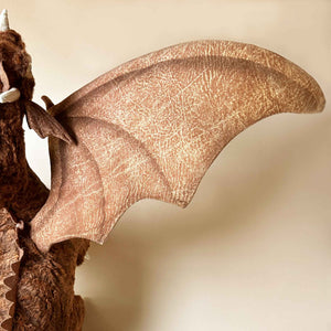 Detail of the stitched wing of Great Winged Chestnut Dragon
