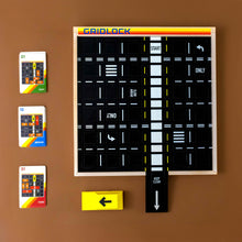 Load image into Gallery viewer, blank-puzzle-board-with-black-roads-and-signage-with-card-pieces
