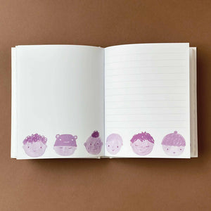 open page of Hard Cover Journal | Baby Face showing illustrations and lined paper