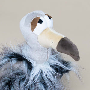 big-beak-and-eyes-on-vulture-stuffed-animal-with-black-and-grey-feathery-fluff