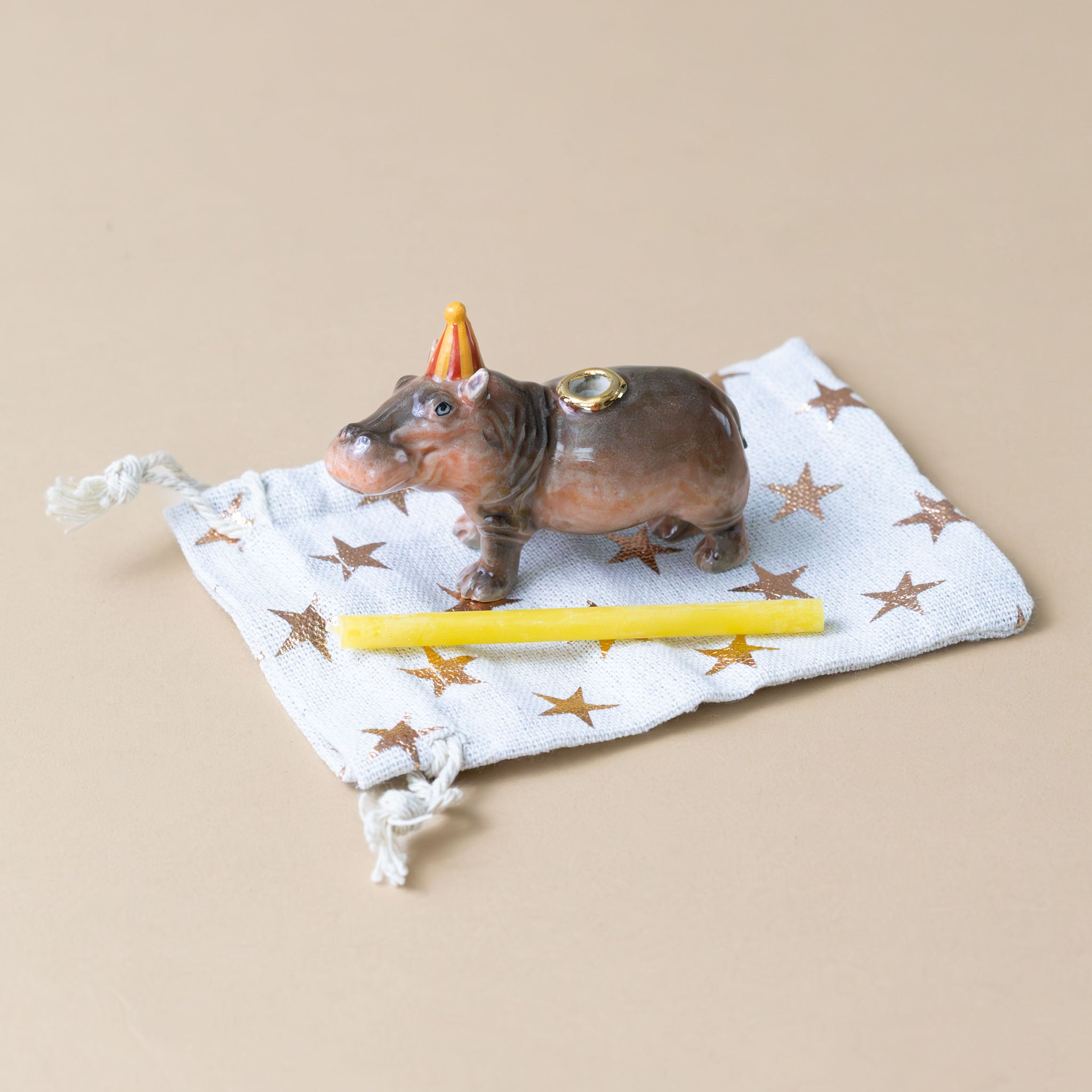 heirloom-porcelain-cake-topper-hippopotamus-candle-bag