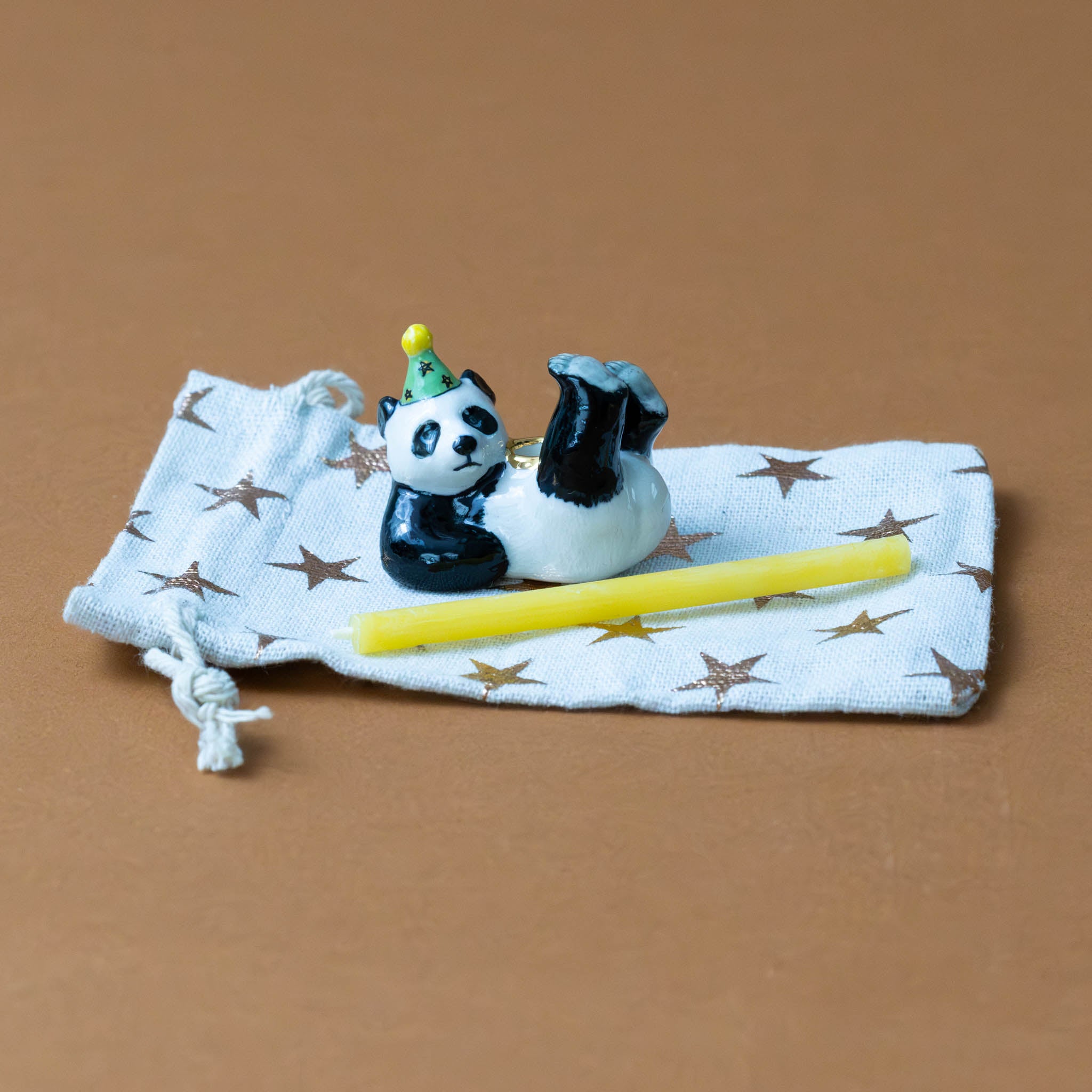 heirloom-porcelain-cake-topper-panda-bear-with-candle-and-bag
