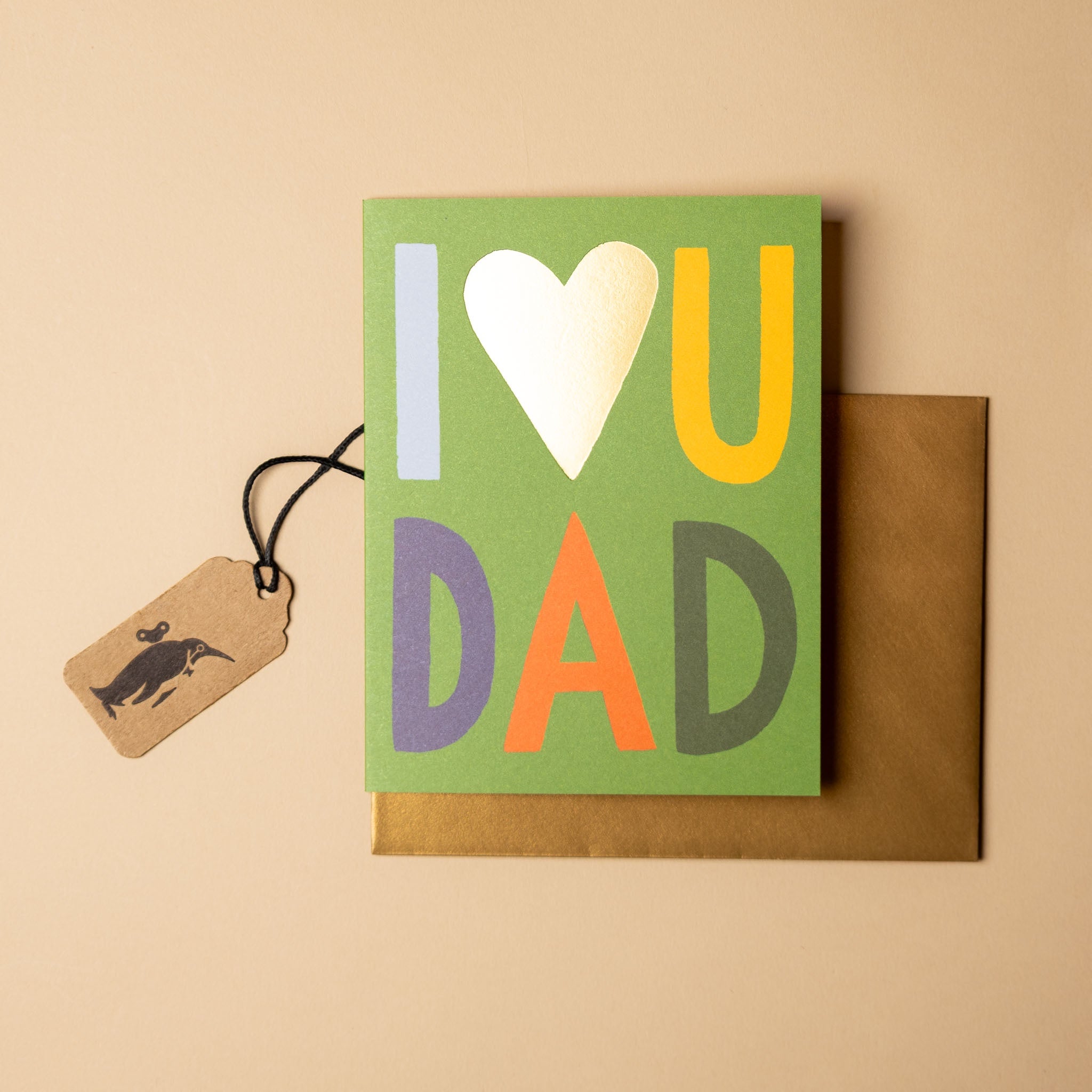 Greeting card with 'I ❤️ U DAD' text on a beige background