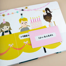 Load image into Gallery viewer, open-book-showing-illustration-of-kids-sitting-on-a-birthday-table-and-flap-to open