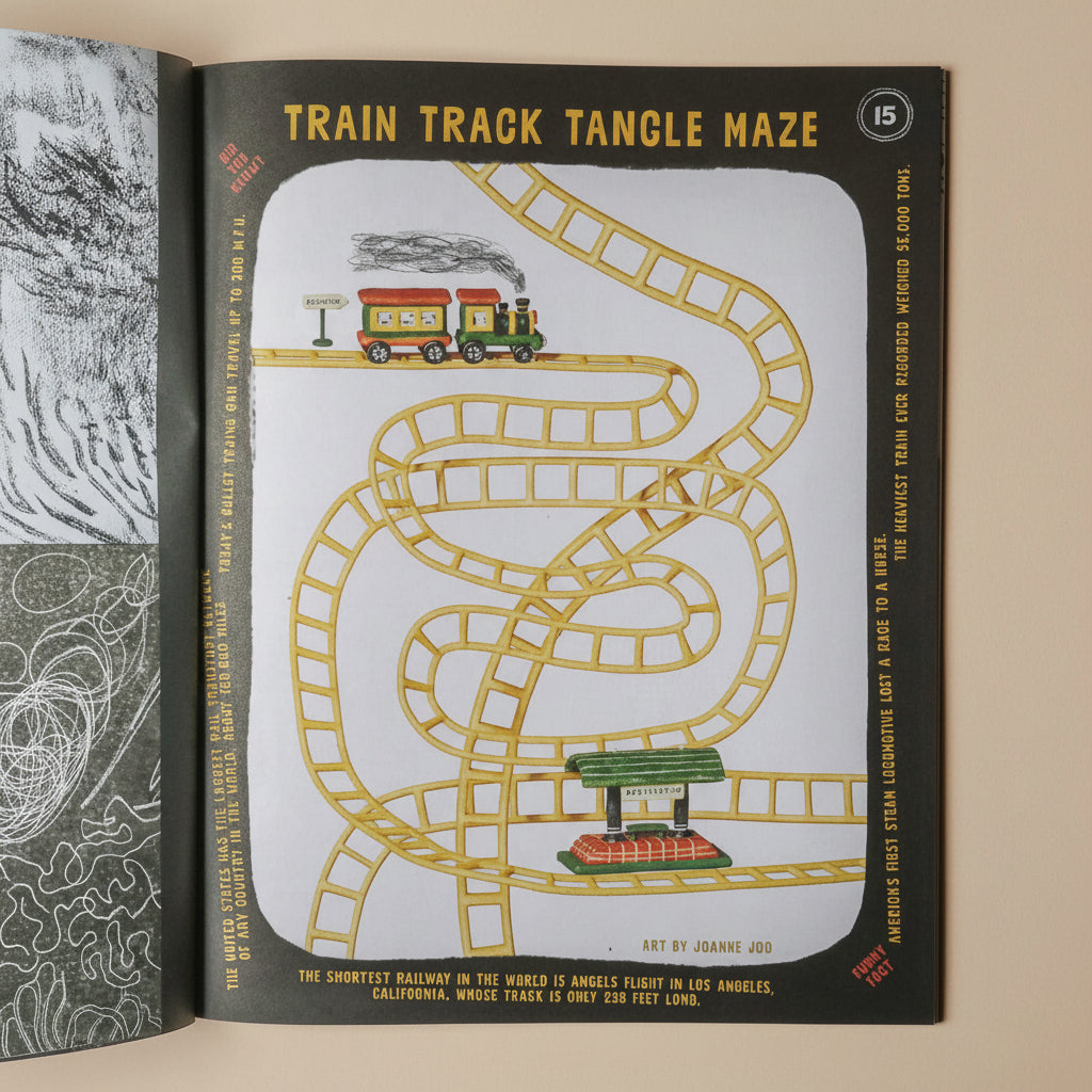 Maze illustoria-magazine-issue-2-comics page with train track illustration and text on a beige background
