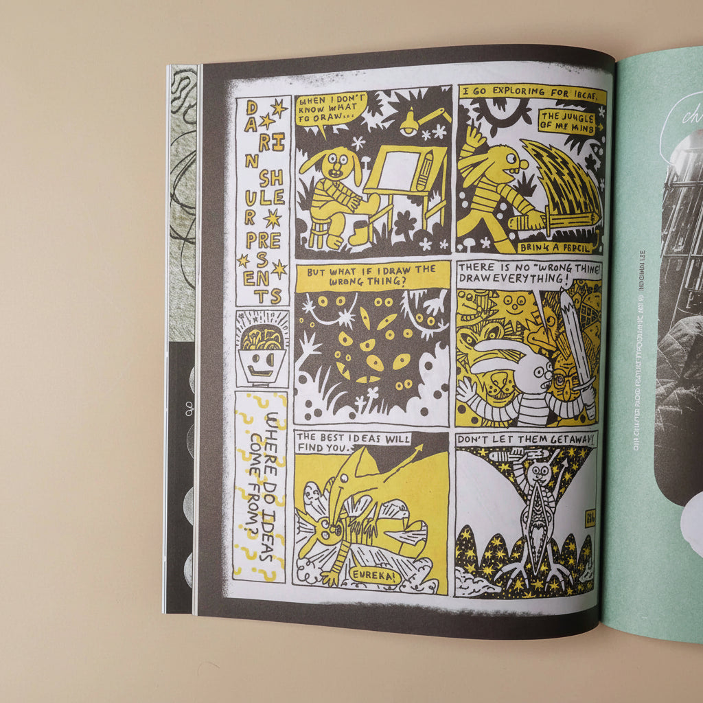 Open illustoria-magazine-issue-2-comics with comic-style illustrations on a beige background