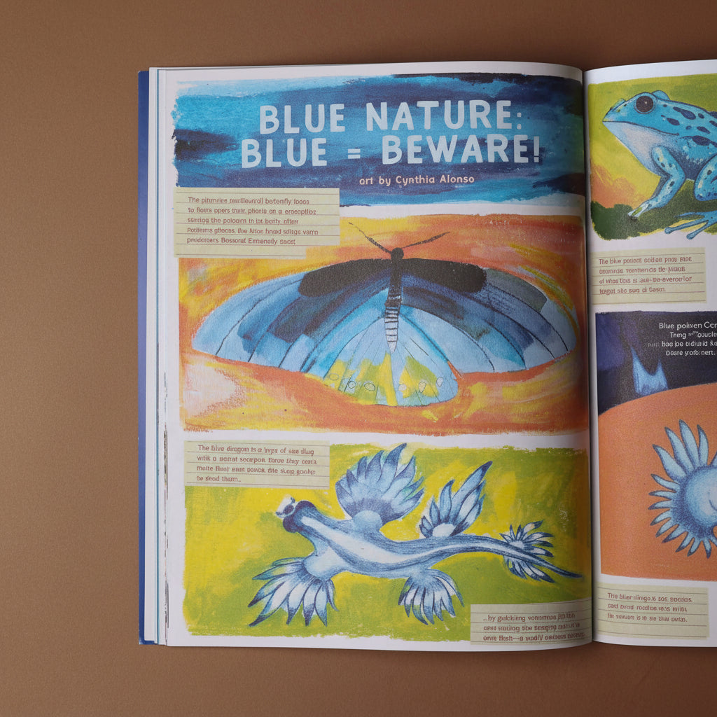 Open illustoria-magazine-issue-26-blue with illustrations of a blue dragon and text on a brown background