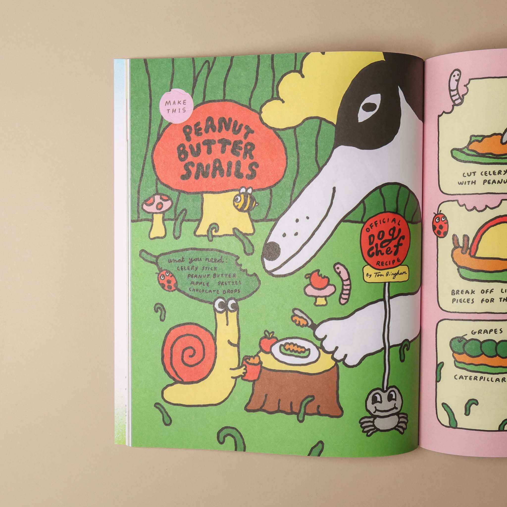 Open book with colorful illustrations of a dog, snail, and other animals on a green background.