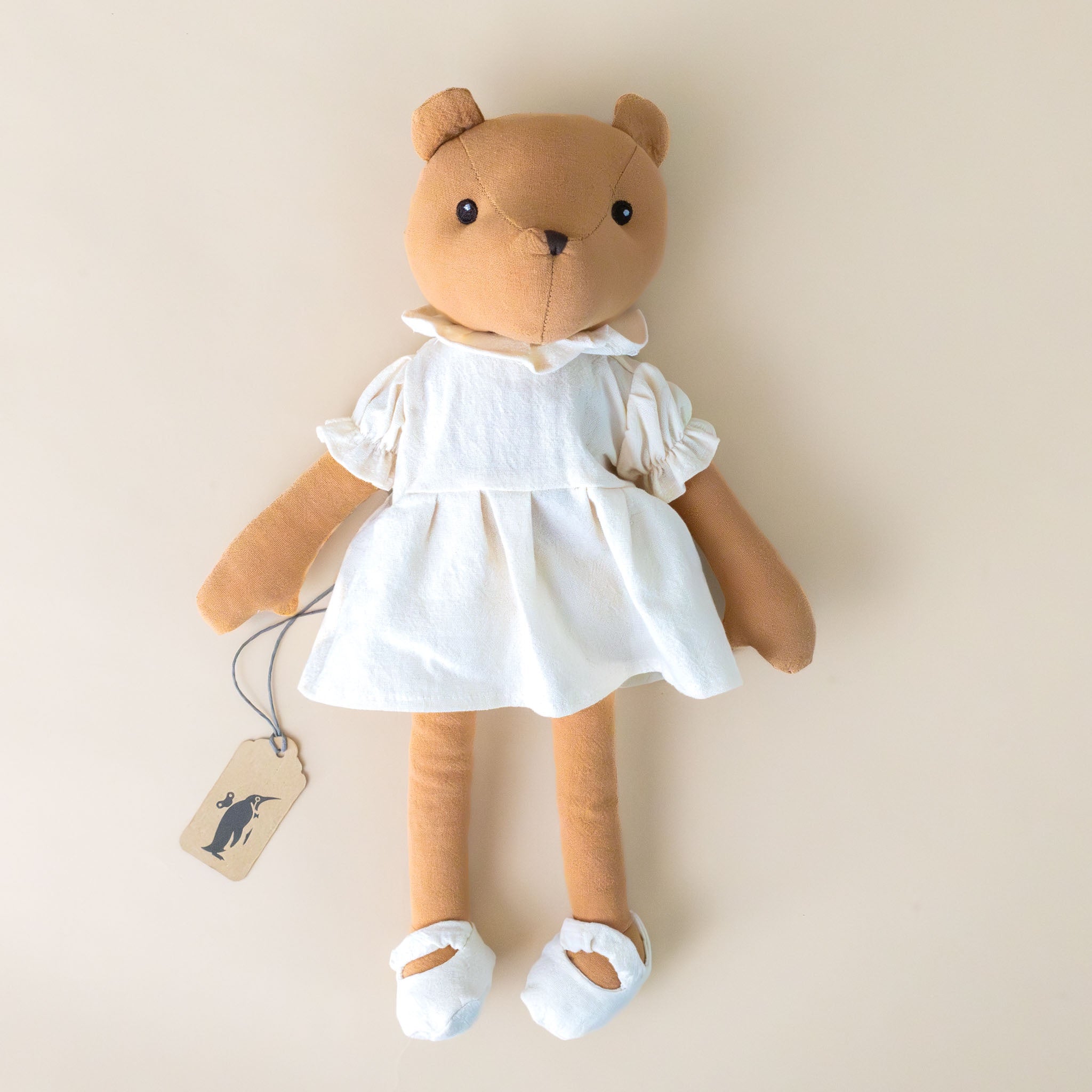 juliette-the-carmel-colored-bear-in-cream-colored-dress-and-shoes