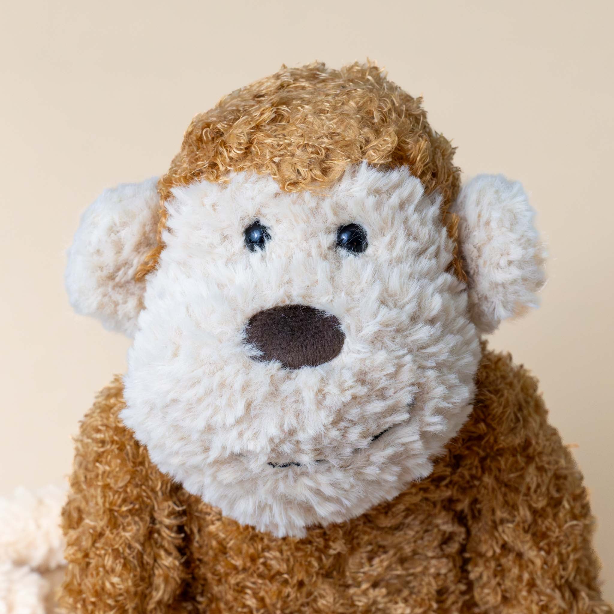 stuffed-animal-junglie-monkey-cream-face-and-paws-with-carmel-colored-body-face-with-brown-button-nose-and-cream-ears