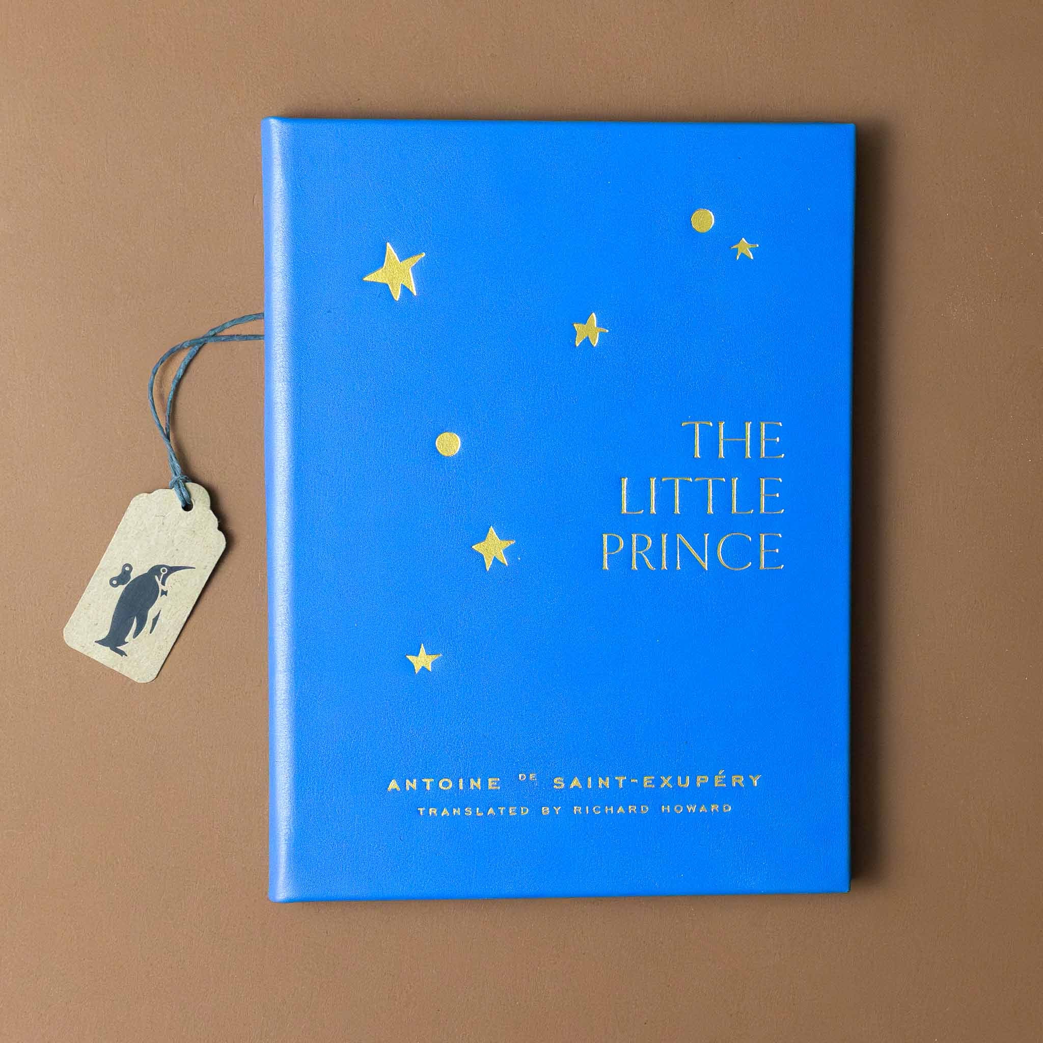 leather-bound-the-little-prince-blue-book-cover-with-gold-foil-stars-planets-and-titles