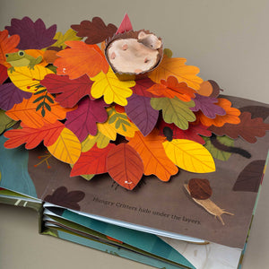 interior-page-with-beautiful-orange-red-and yellow-tree-leaves-with-critters