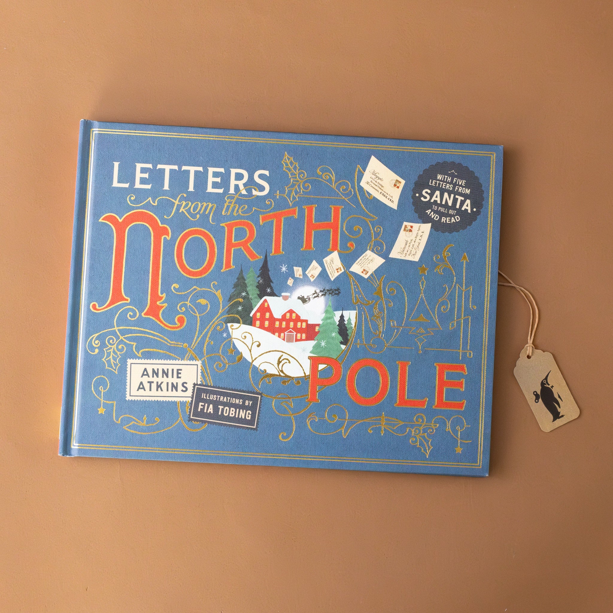 letters-from-the-north-pole-book-cover-in-navy-with-image-of-the-north-pole