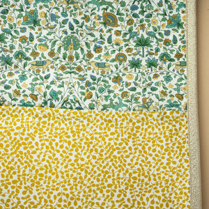 detail-showing-green-gold-and-yellow-print-with-gold-lame-bias