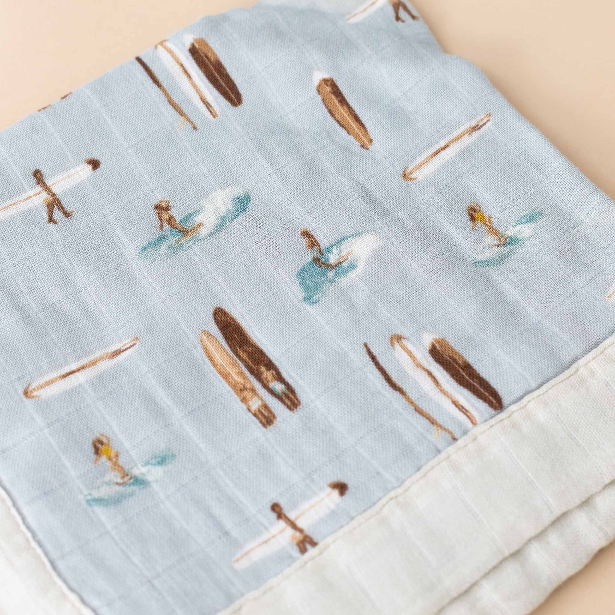 little-lovie-vintage-surf-board-on-soft-blue-background-folded