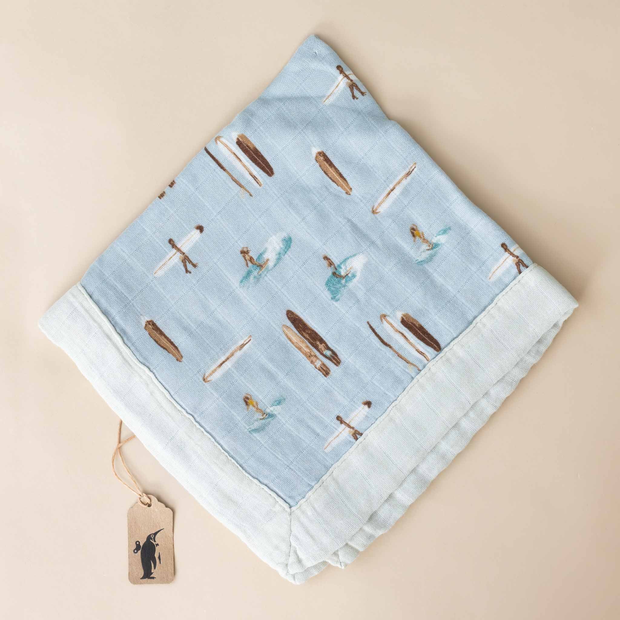 little-lovie-vintage-surf-board-on-soft-blue-background-folded